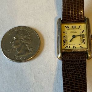 Vintage Cartier tank watch with original band